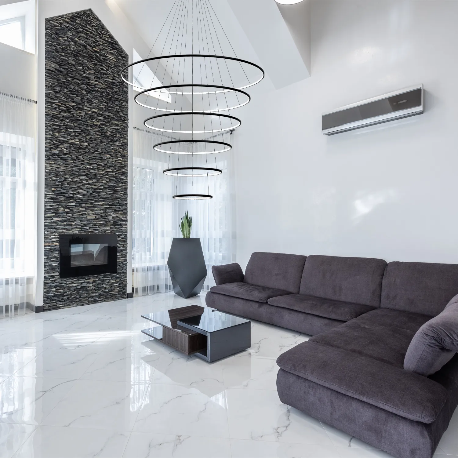 Design LED-Pendelleuchte Orbit No.6 – sechs LED-Ringe über einem eleganten Esstisch